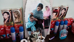 Afghan girls practice beauty care