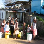 Children collect water South Africa