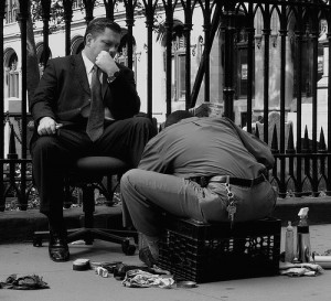 Income inequality shoe shine