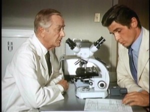 Marcus Welby and Steven Kiley at microscope
