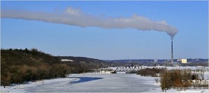 Smoke blowing from smokestack