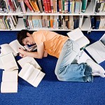 Teen asleep on library floor