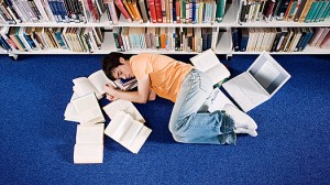 Teen asleep on library floor