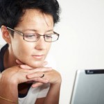 Woman reading computer